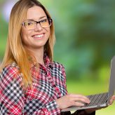 young-female-working-laptop 2300×766